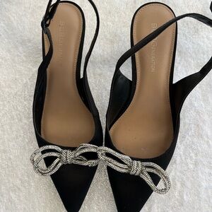 BCBGeneration Black Heels with Silver Knot Accent